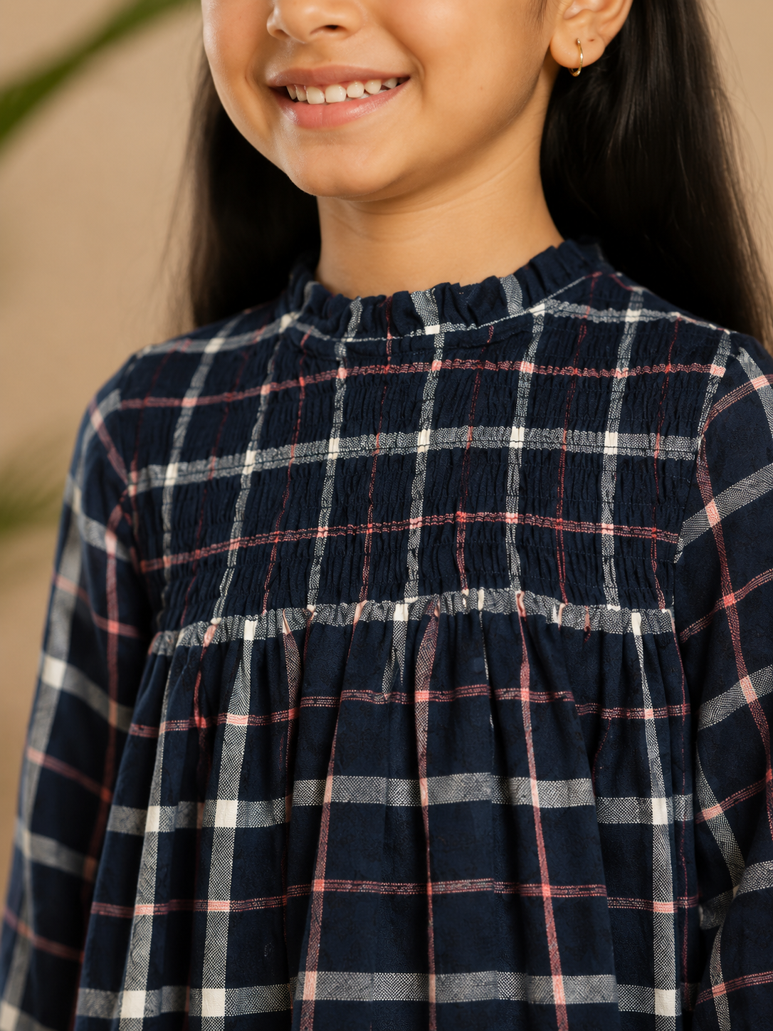 Navy blue checked girls long sleeve A-line dress with ruffle detailing and flared hem