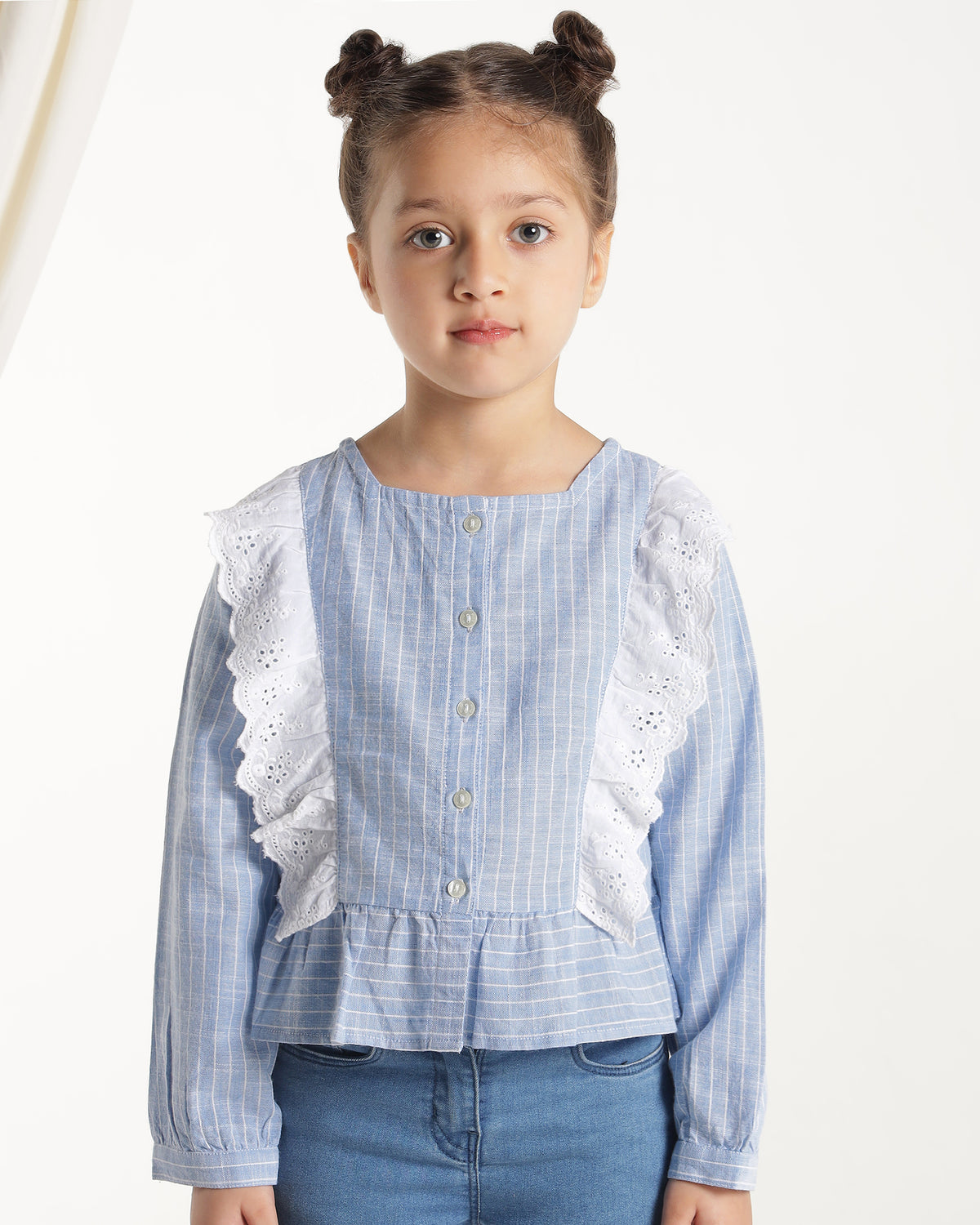 Blue and white striped girls long sleeve top with ruffle front detailing
