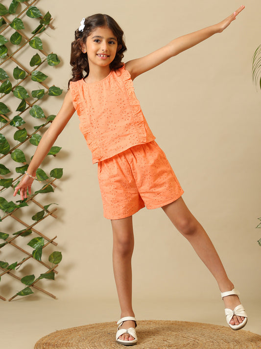 Orange girls sleeveless co-ord set with textured ruffle top and matching shorts