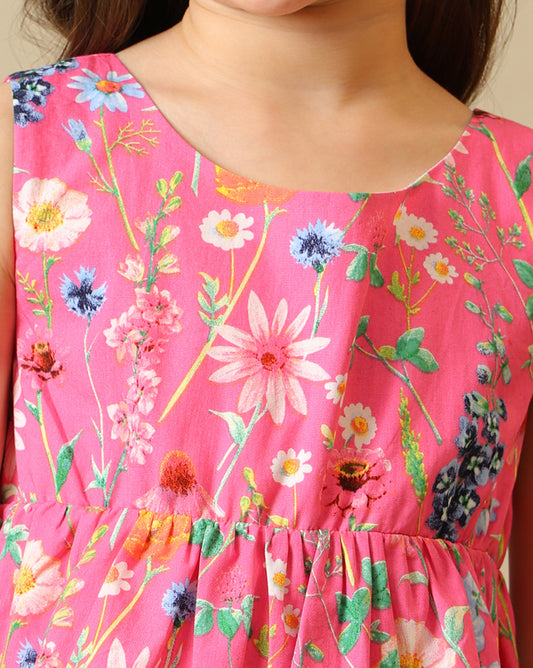 Pink floral printed girls sleeveless fit and flare dress with tiered hem