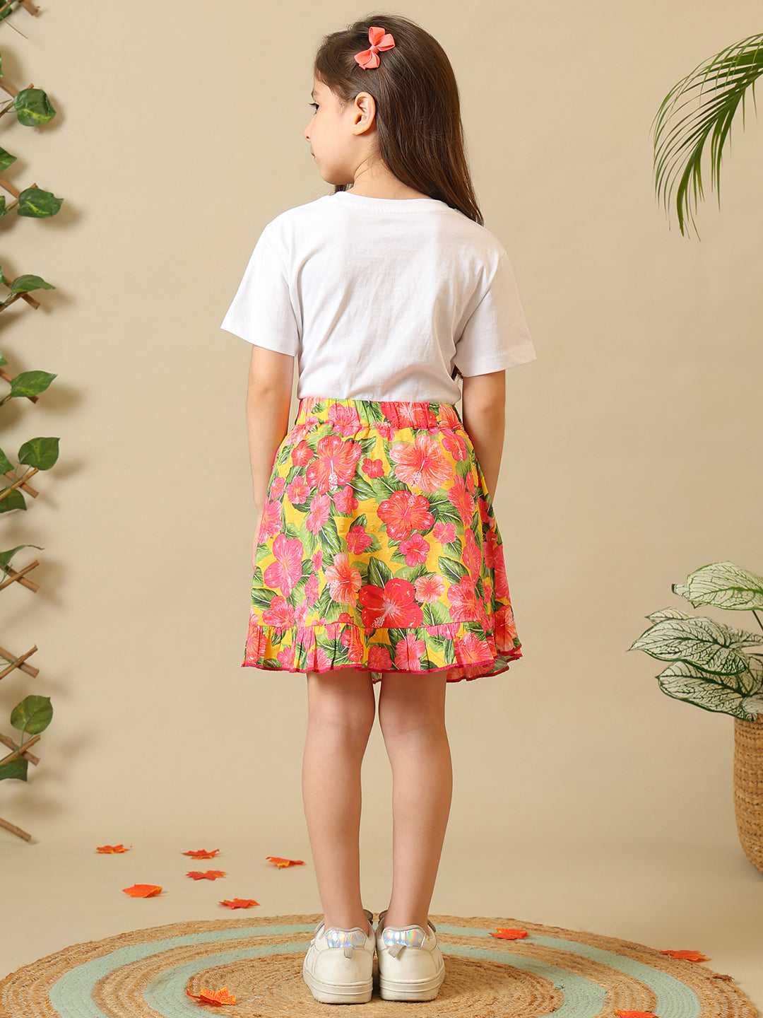 White girls short sleeve top with multicolour floral printed skirt