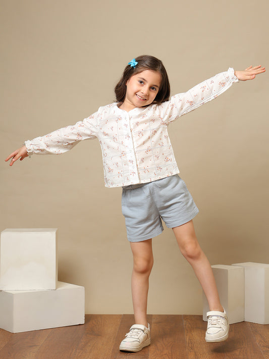 White girls floral embroidered long sleeve top with ruffle detailing and blue shorts