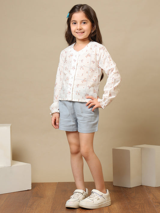 White girls floral embroidered long sleeve top with ruffle detailing and blue shorts