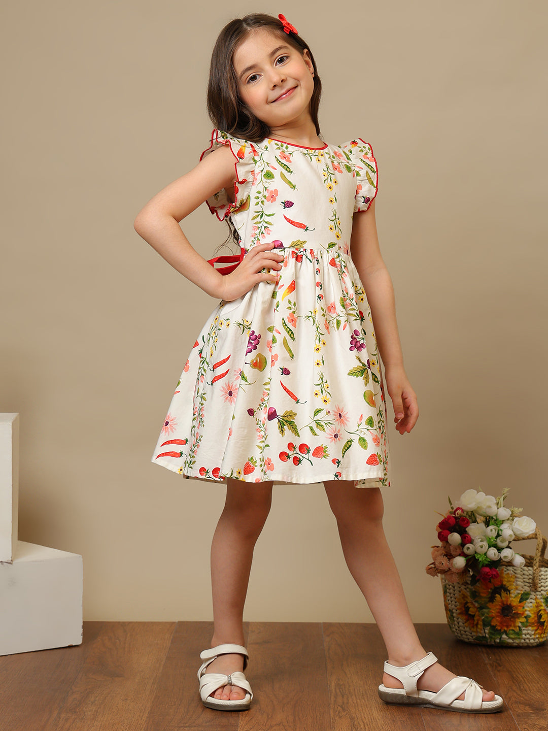 Cream girls floral printed fit and flare dress with ruffle sleeves and gathered waist