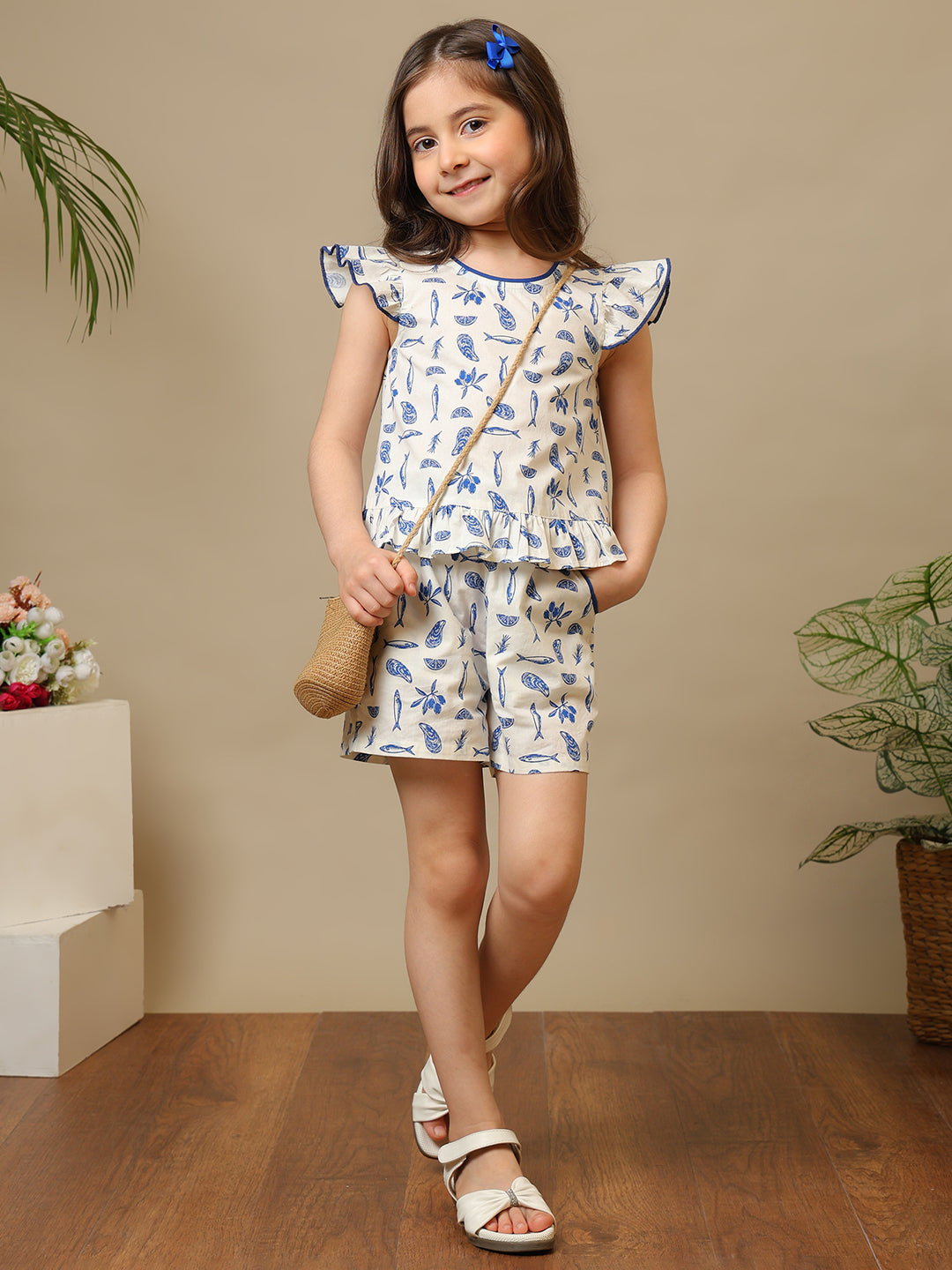 White and blue floral printed girls co-ord set with ruffle sleeve top and matching shorts