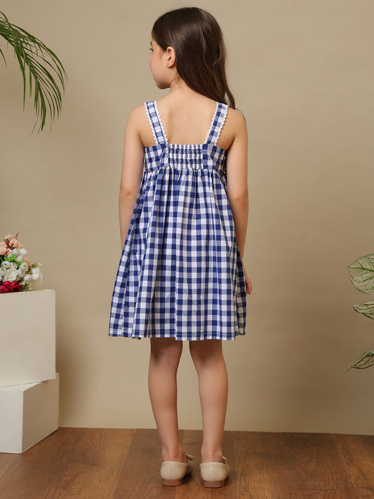 Blue and white gingham girls sleeveless A-line dress with shoulder straps and flared hem
