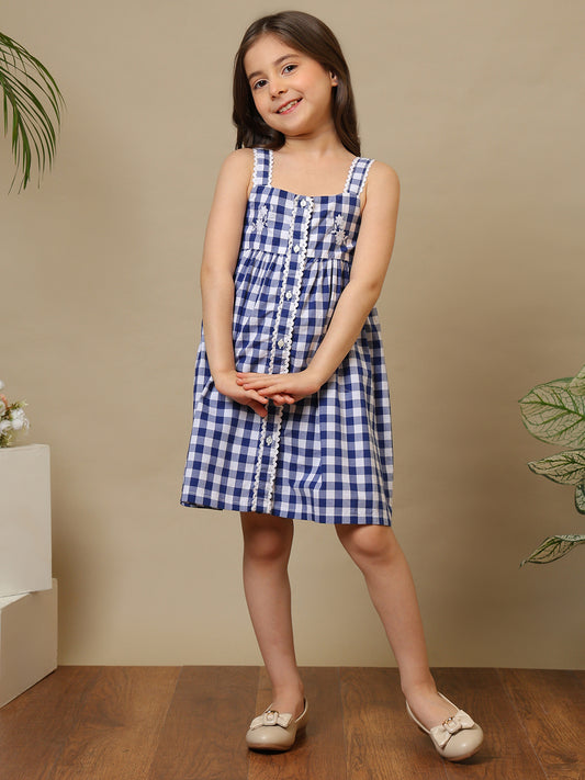 Blue and white gingham girls sleeveless A-line dress with shoulder straps and flared hem