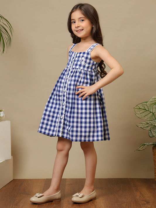 Blue and white gingham girls sleeveless A-line dress with shoulder straps and flared hem