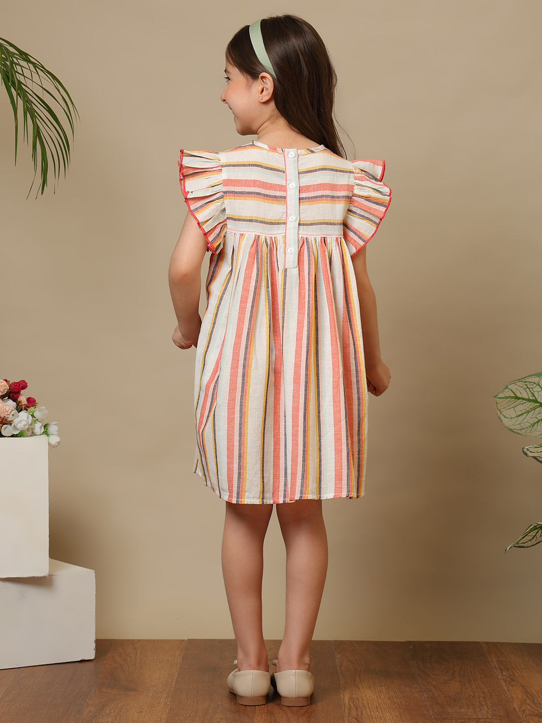 Multicolour striped girls dress with ruffle sleeves, embroidered detailing and flared hem