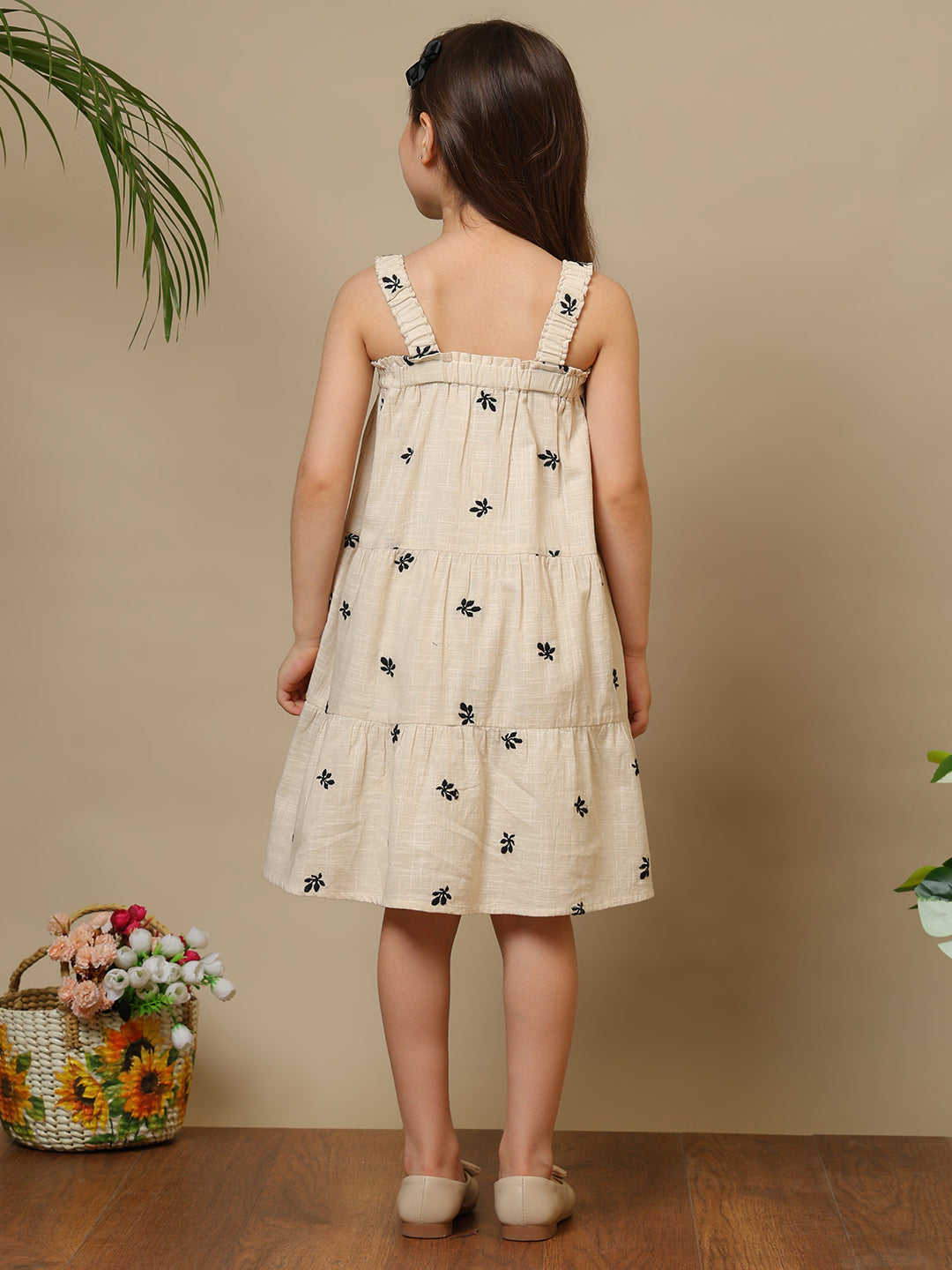 Green and pink floral printed girls fit and flare dress with shoulder straps and flared hem