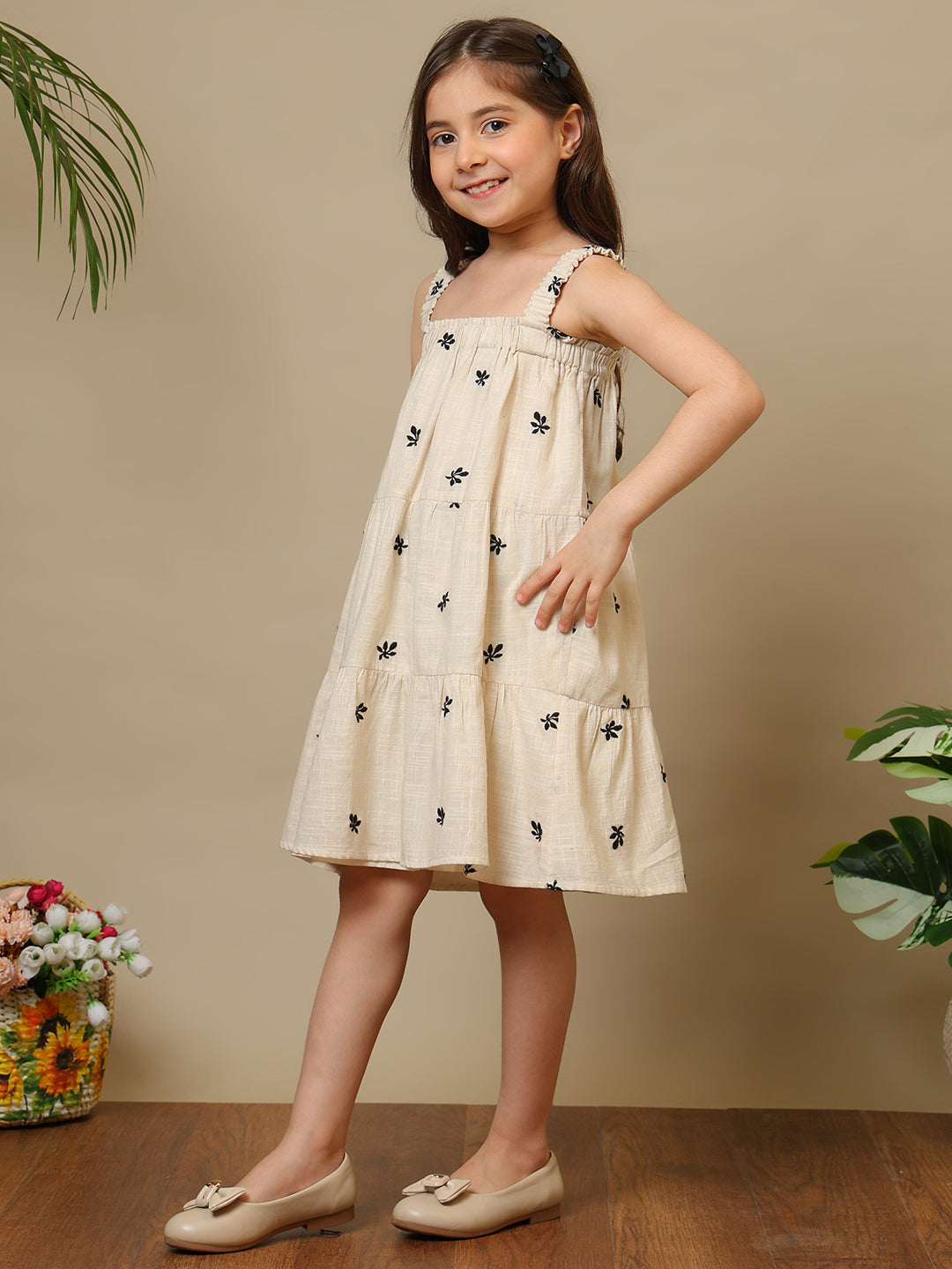 Green and pink floral printed girls fit and flare dress with shoulder straps and flared hem