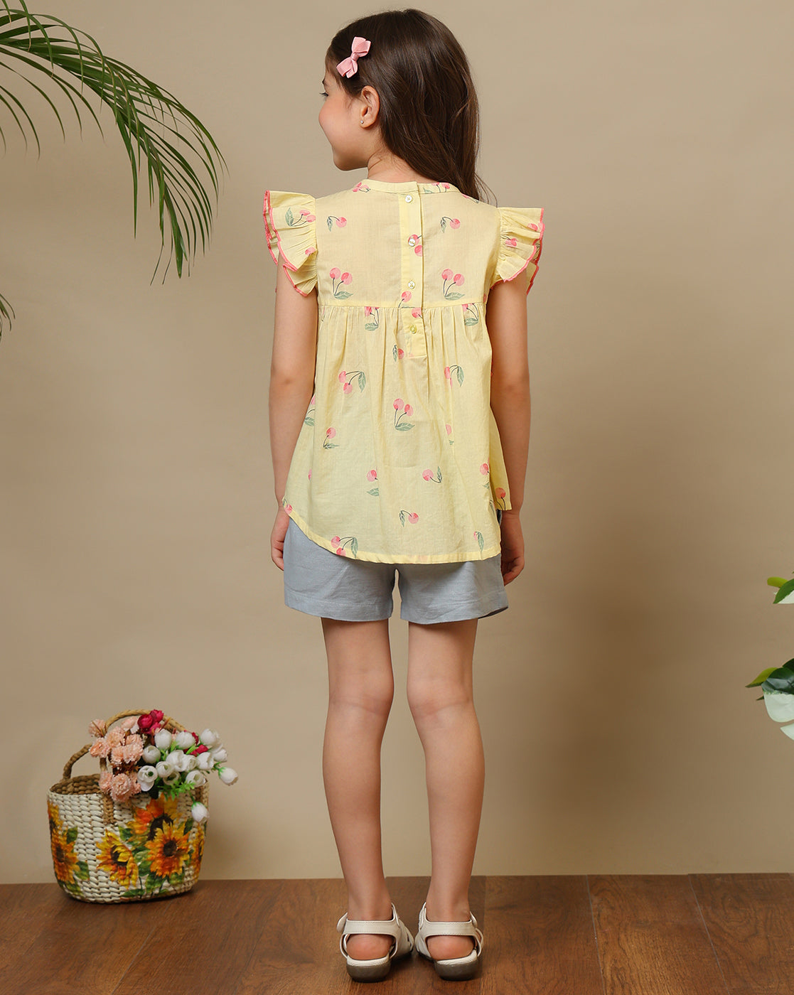 Yellow girls floral printed top with ruffle sleeves and white shorts co-ord set