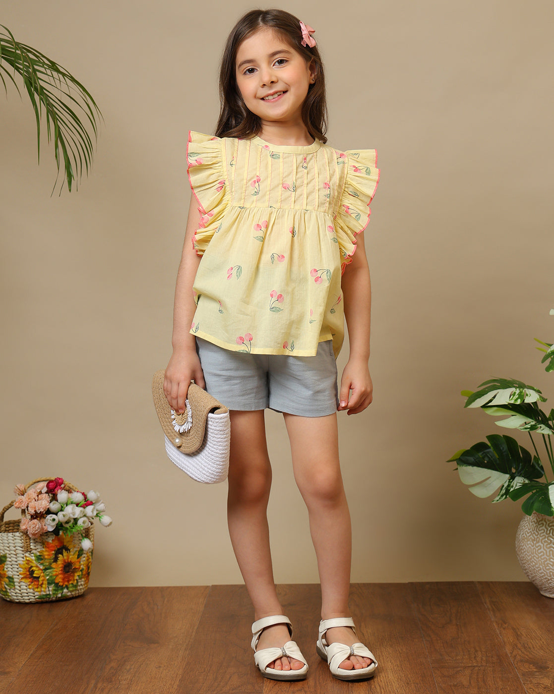 Yellow girls floral printed top with ruffle sleeves and white shorts co-ord set