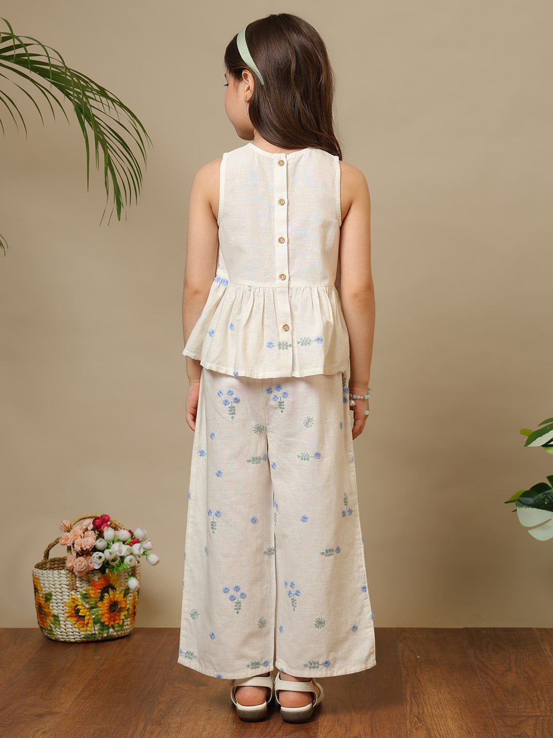 Cream girls embroidered co-ord set with peplum sleeveless top and wide-leg pants