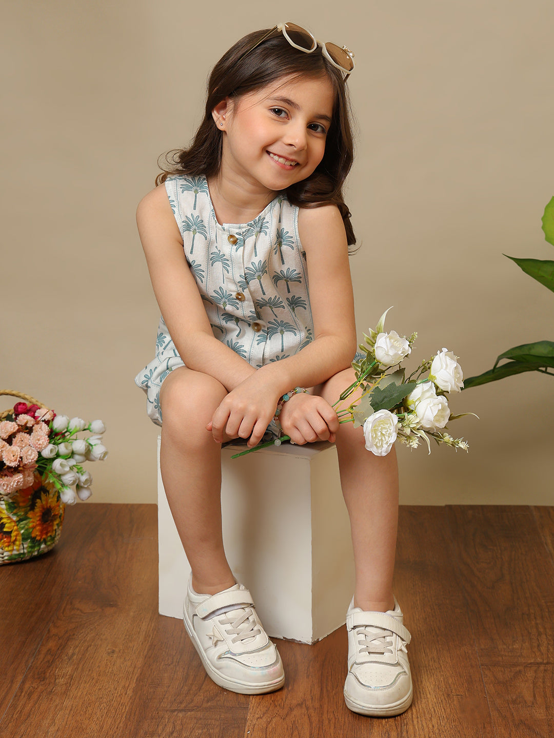 White girls floral printed sleeveless co-ord set with ruffle detailing and matching shorts