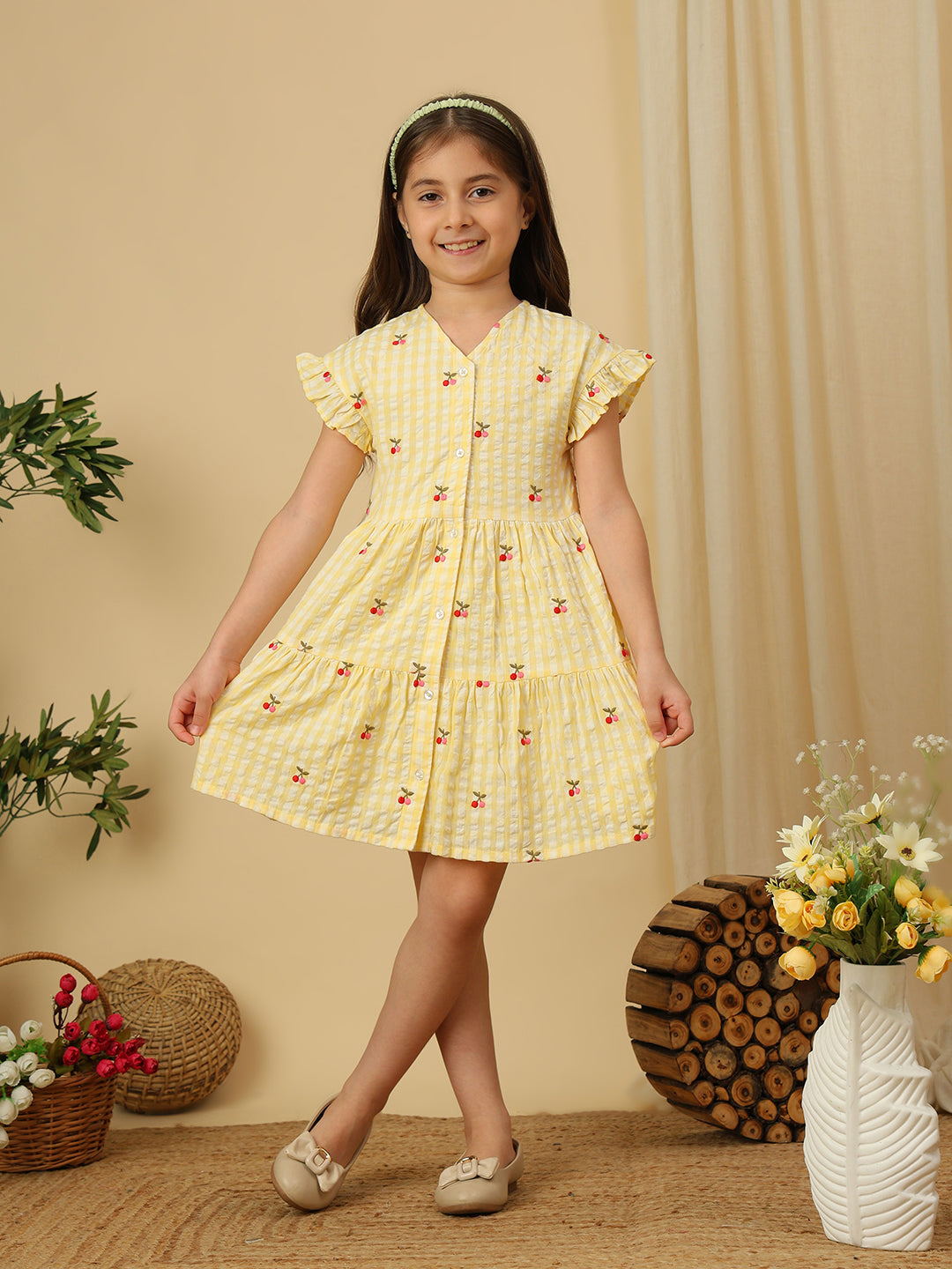 Girls pink gingham checked dress with all-over cherry print, ruffle sleeves and gathered flared silhouette
