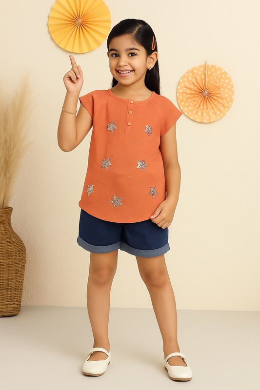 Orange girls short sleeve top with floral embroidery and high-low hem