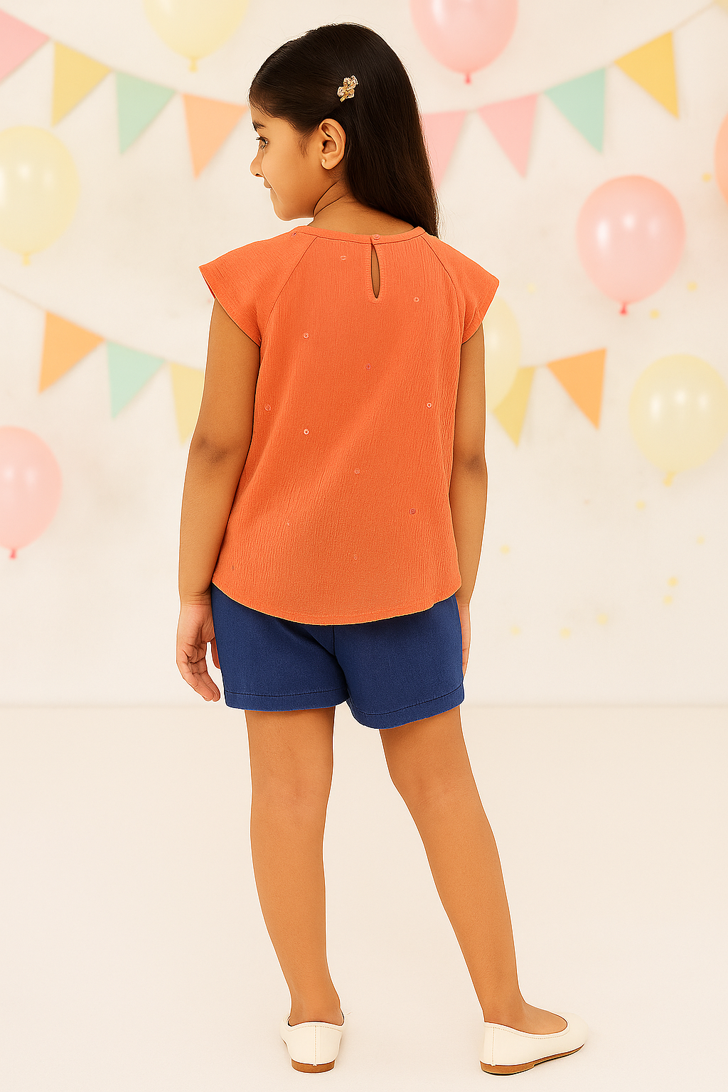Orange girls short sleeve top with floral embroidery and high-low hem