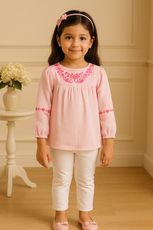 Pink girls short sleeve top with ruffle neckline and gathered sleeve detailing