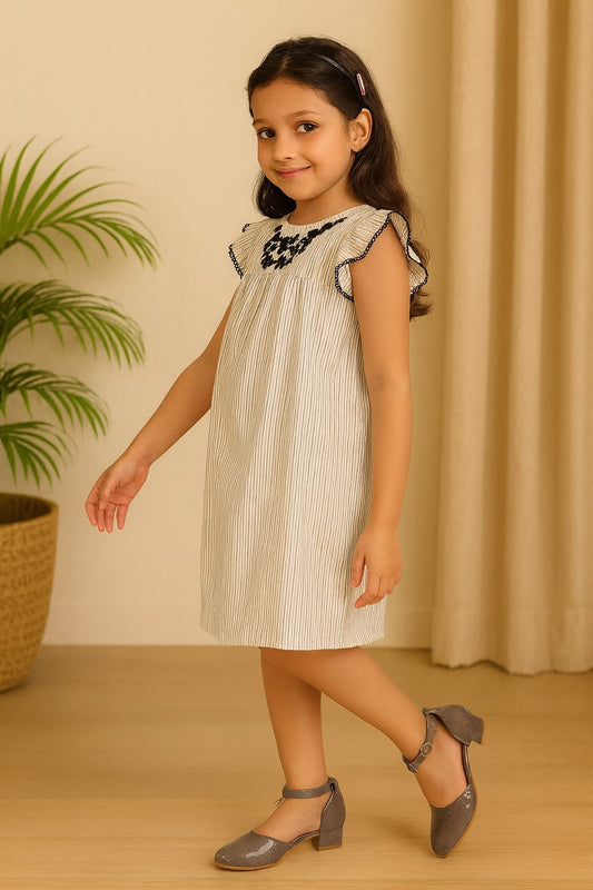 White girls short sleeve A-line dress with black embroidered neckline and flared hem
