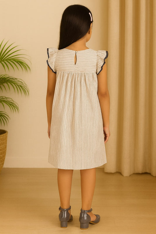 White girls short sleeve A-line dress with black embroidered neckline and flared hem