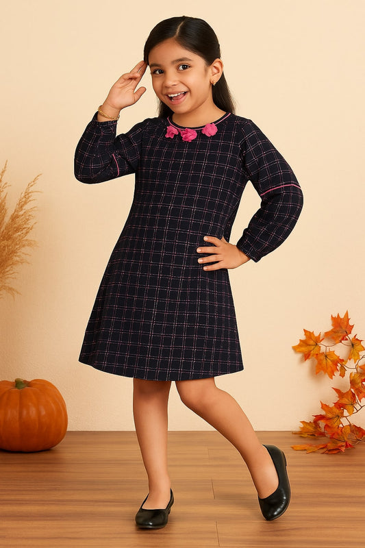 Navy blue girls long sleeve fit and flare dress with pink bow detailing and flared skirt