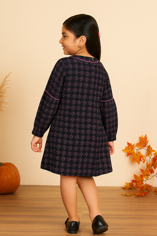 Navy blue girls long sleeve fit and flare dress with pink bow detailing and flared skirt