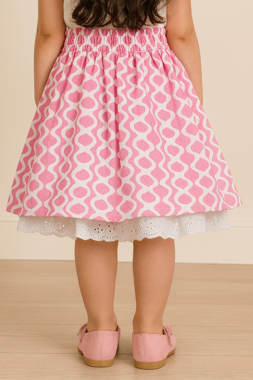 White and pink floral printed girls tiered skirt with ruffle detailing