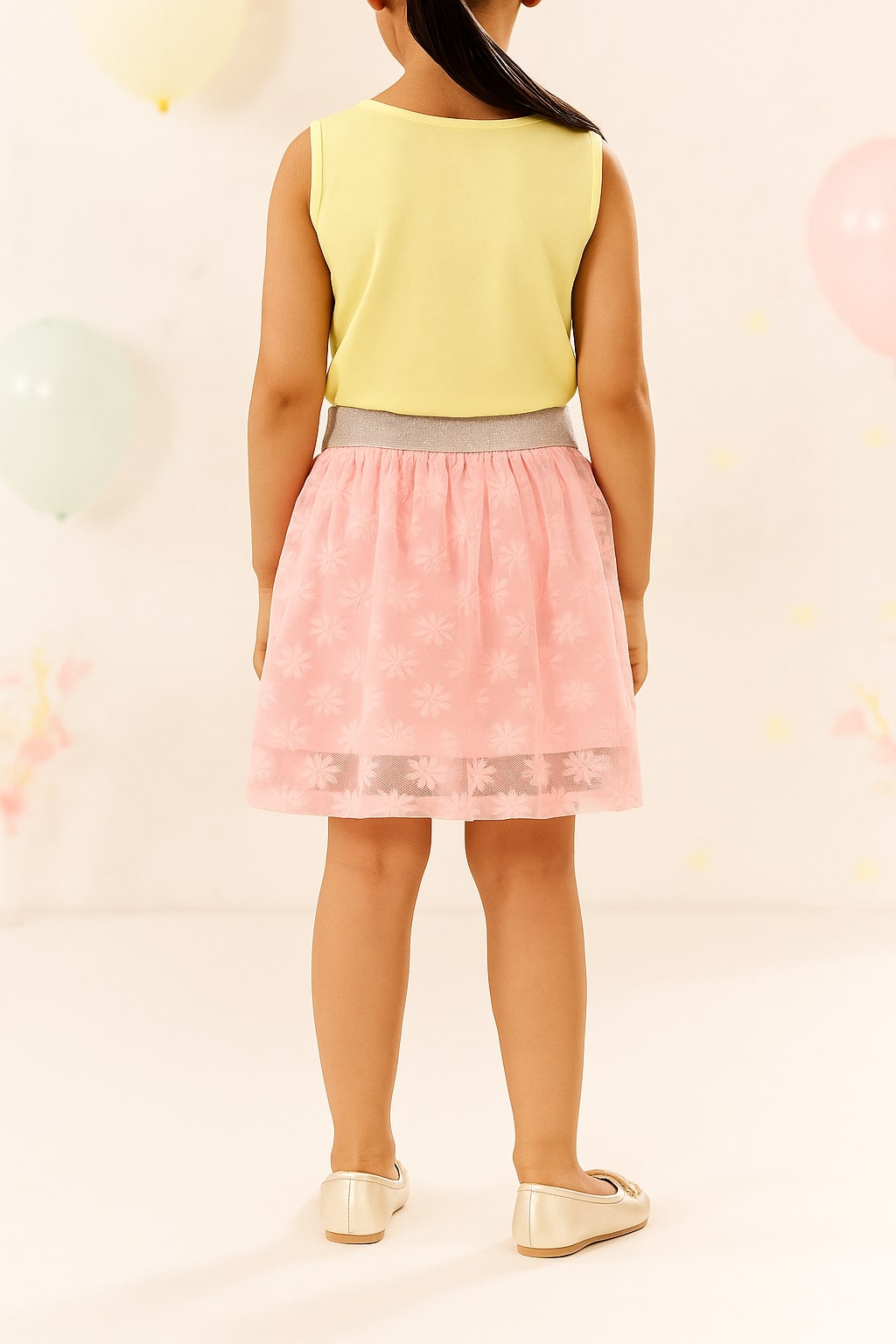 Pink girls polka dot flared skirt with elasticated waist and layered hem