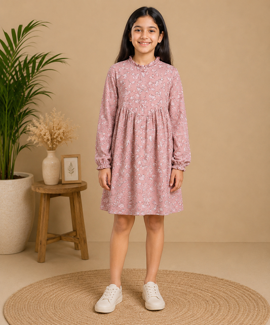 Dusty pink girls long sleeve dress with gathered waist and ruffle hem