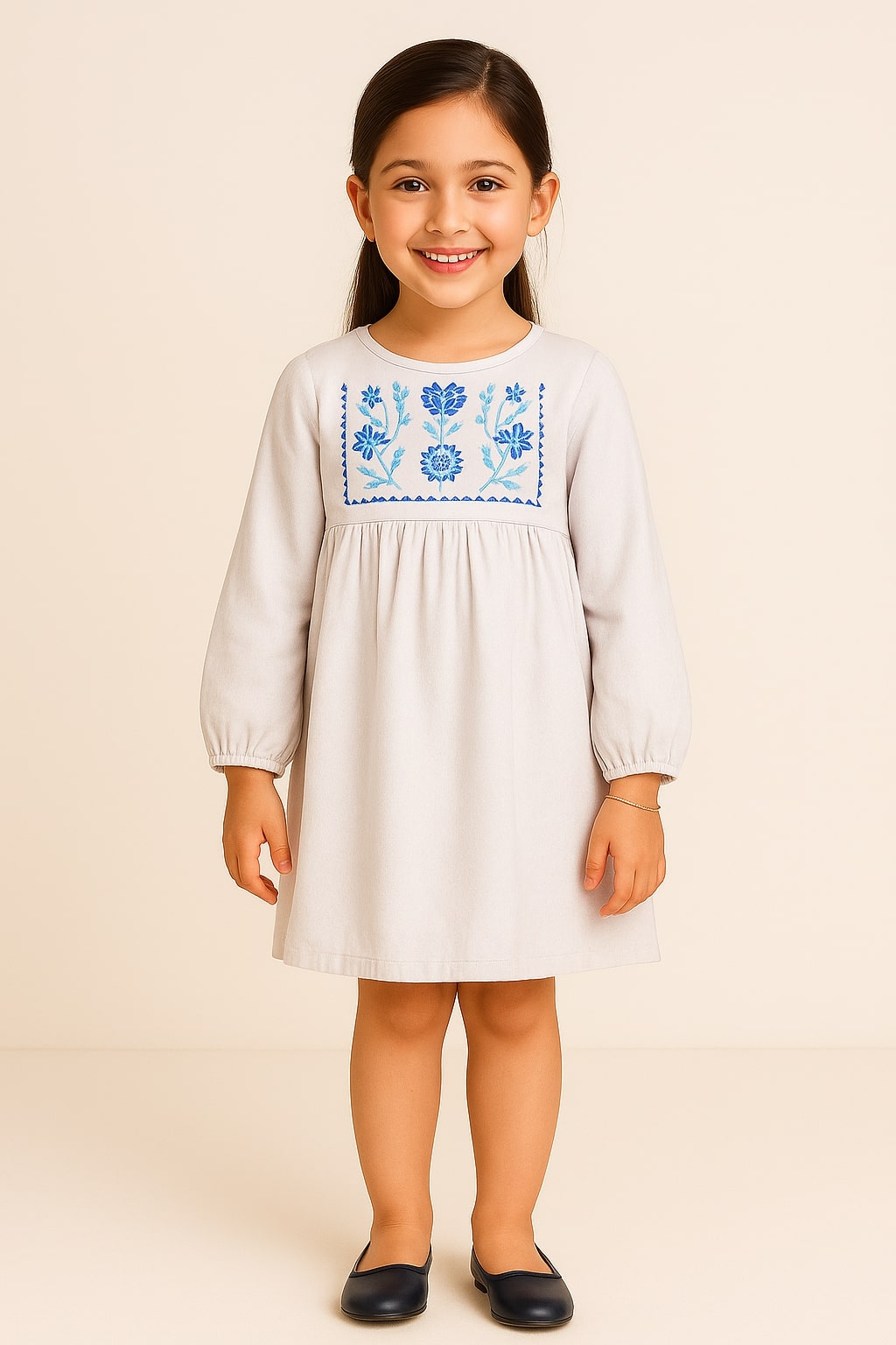 White girls long sleeve dress with colourful embroidered detailing and gathered waist