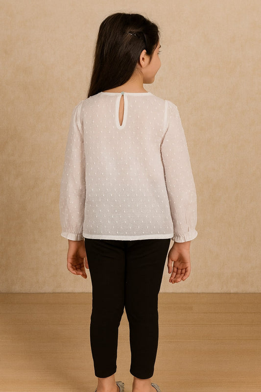 White girls long sleeve top with ruffle neckline and printed detailing