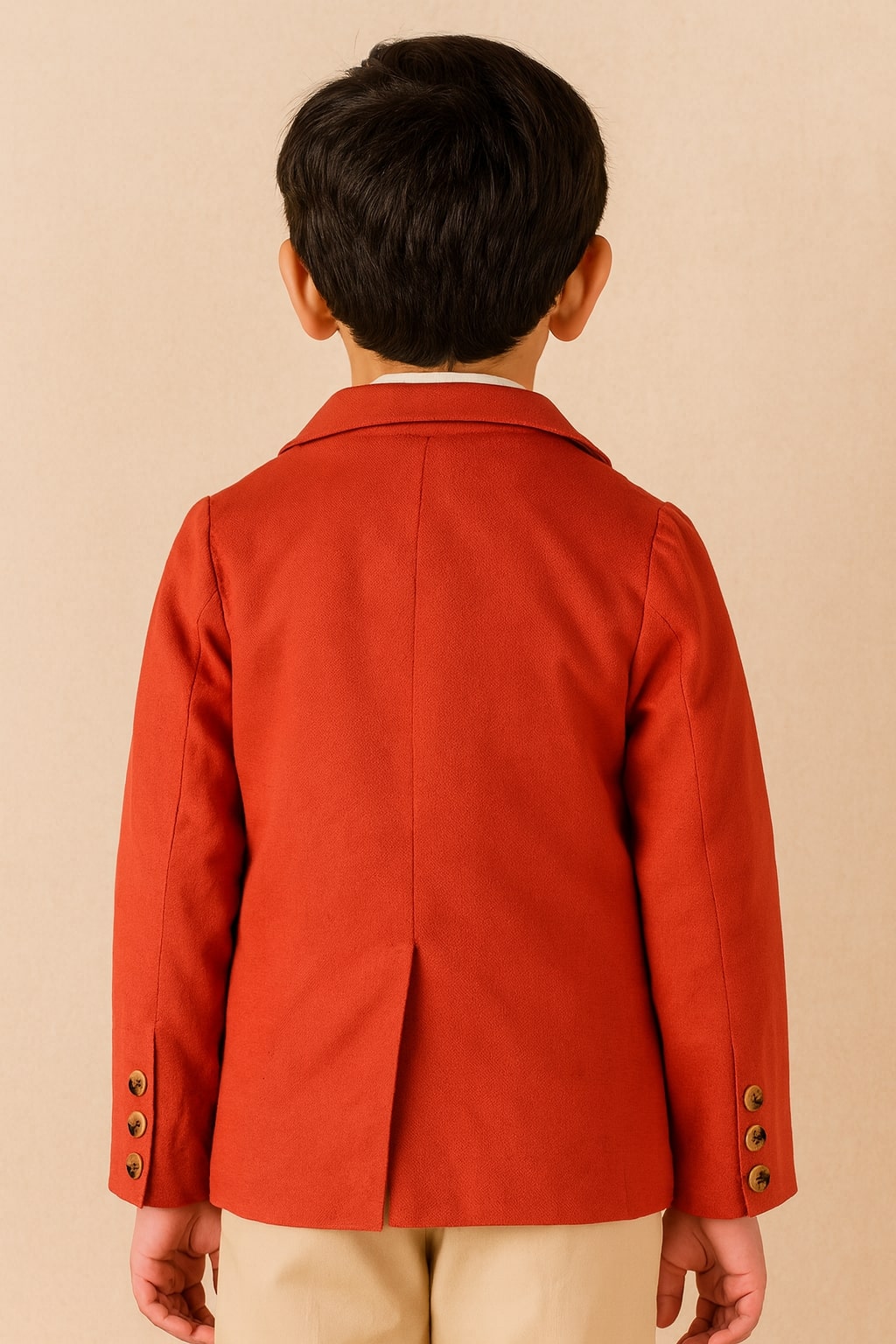 Red boys long sleeve casual jacket with front button closure and contrast detailing
