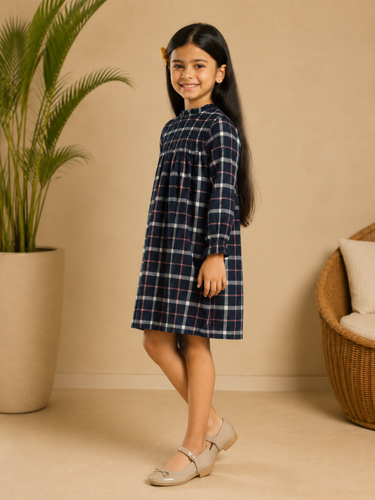 Navy blue checked girls long sleeve A-line dress with ruffle detailing and flared hem
