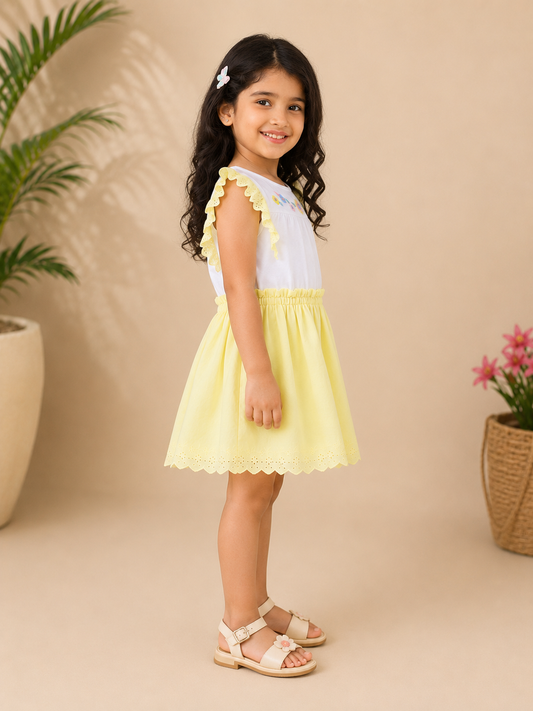 White girls sleeveless top with yellow striped skirt and gathered waist