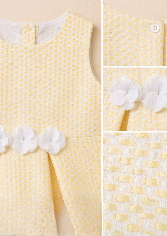 Cream girls sleeveless co-ord set with ruffle top and matching shorts