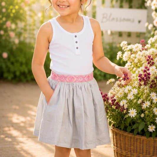 White girls pleated skirt with elasticated waist and flared hem