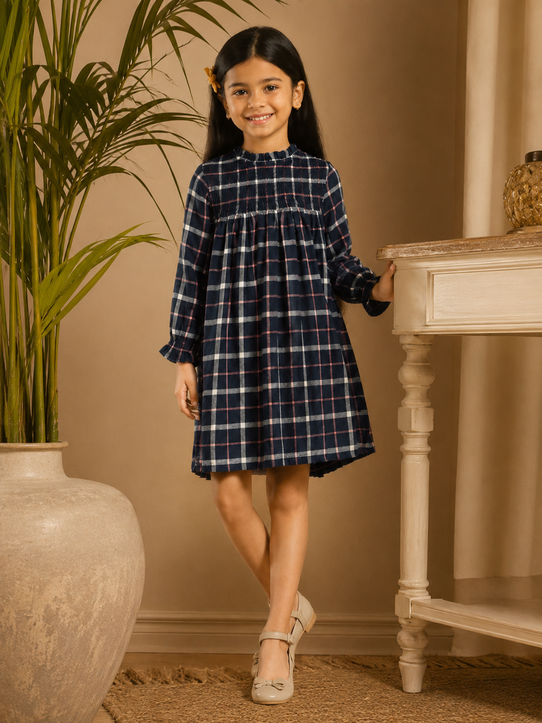 Navy blue checked girls long sleeve A-line dress with ruffle detailing and flared hem