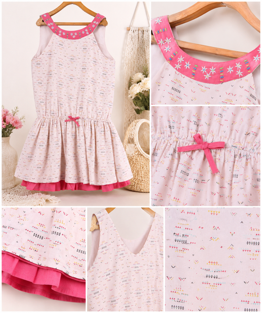 White and pink striped girls sleeveless dress with tiered ruffle hem