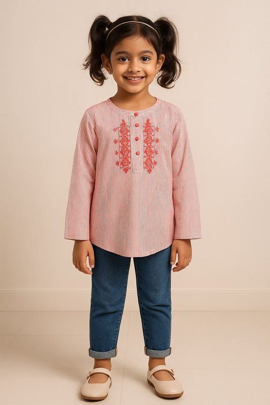 Pink girls long sleeve top with ruffle front detailing and round neckline