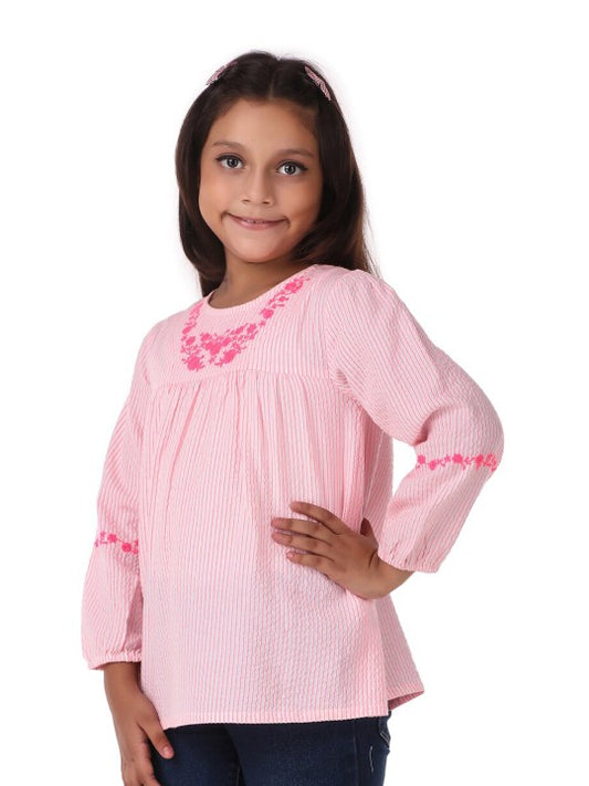 Pink girls short sleeve top with ruffle neckline and gathered sleeve detailing