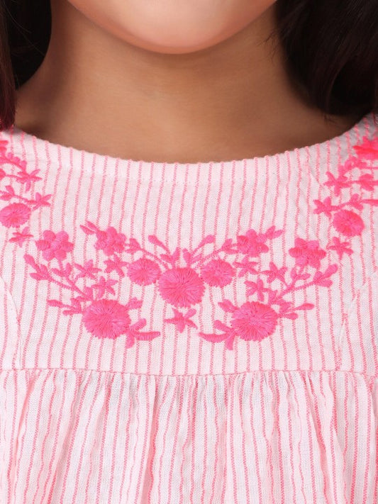 Pink girls short sleeve top with ruffle neckline and gathered sleeve detailing