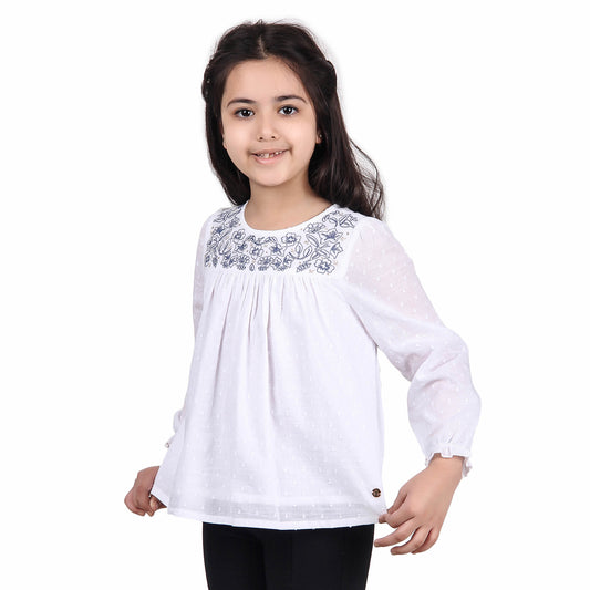 White girls long sleeve top with ruffle neckline and printed detailing
