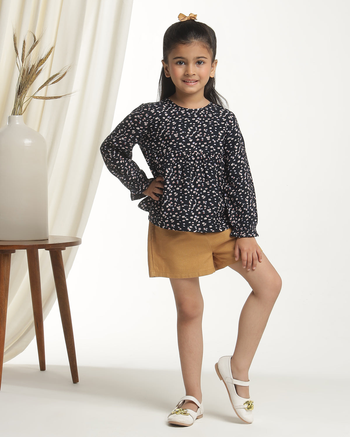Black girls floral printed long sleeve top with ruffle detailing