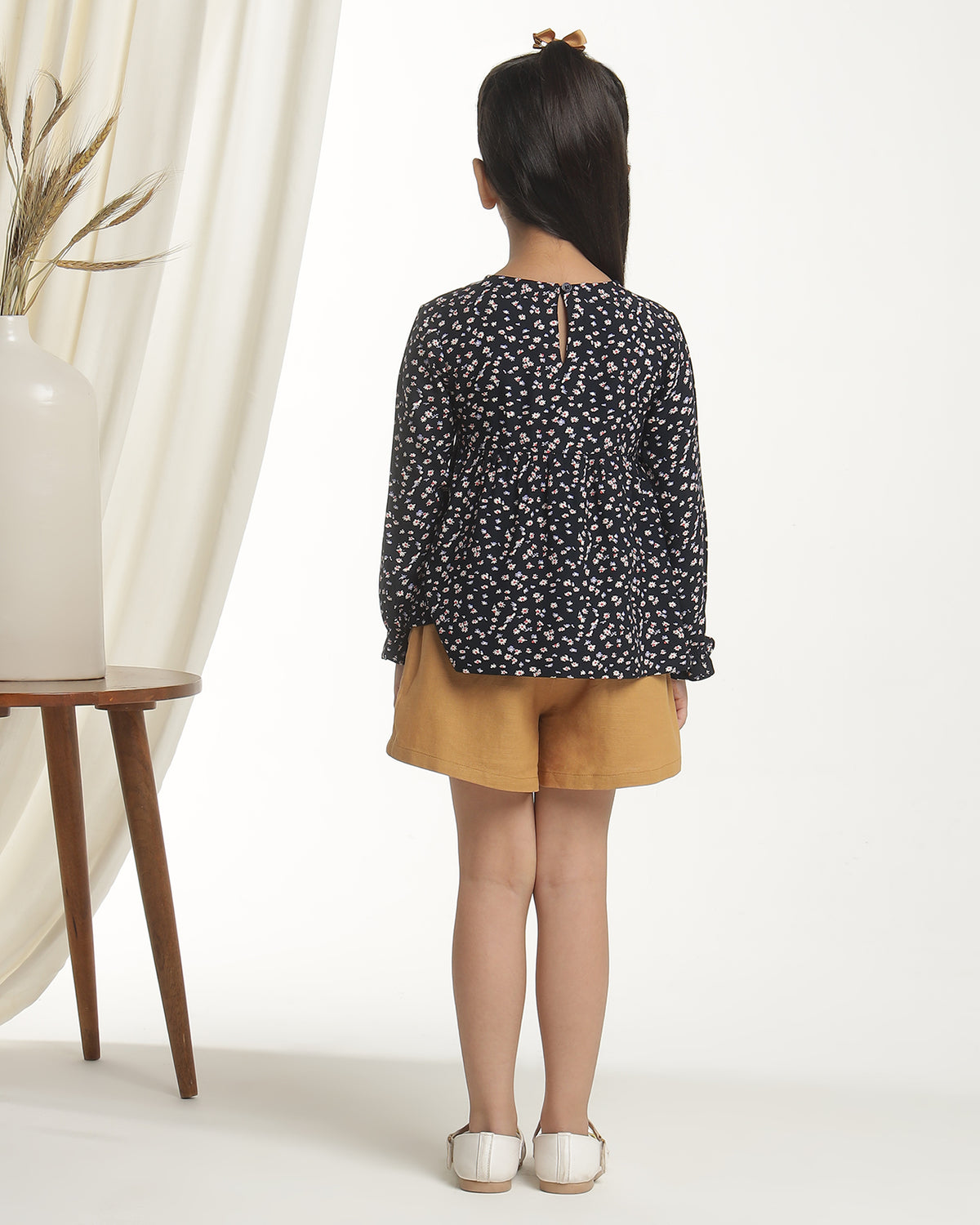 Black girls floral printed long sleeve top with ruffle detailing