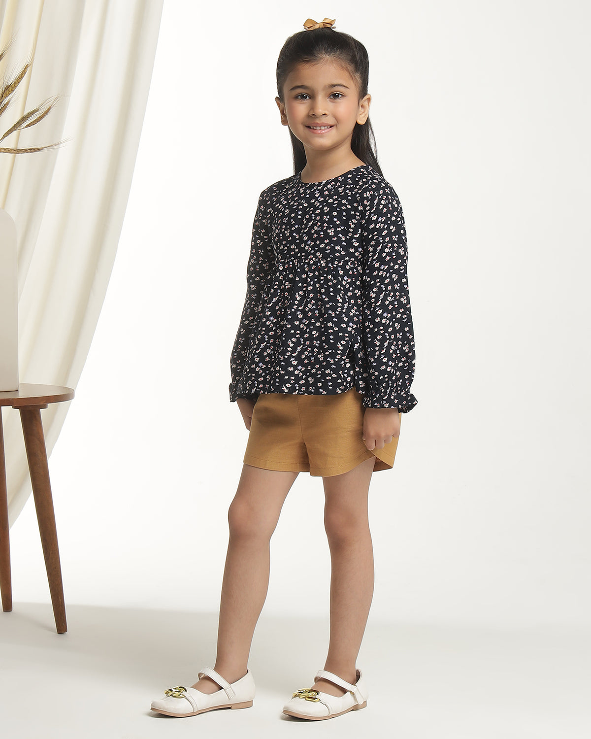 Black girls floral printed long sleeve top with ruffle detailing