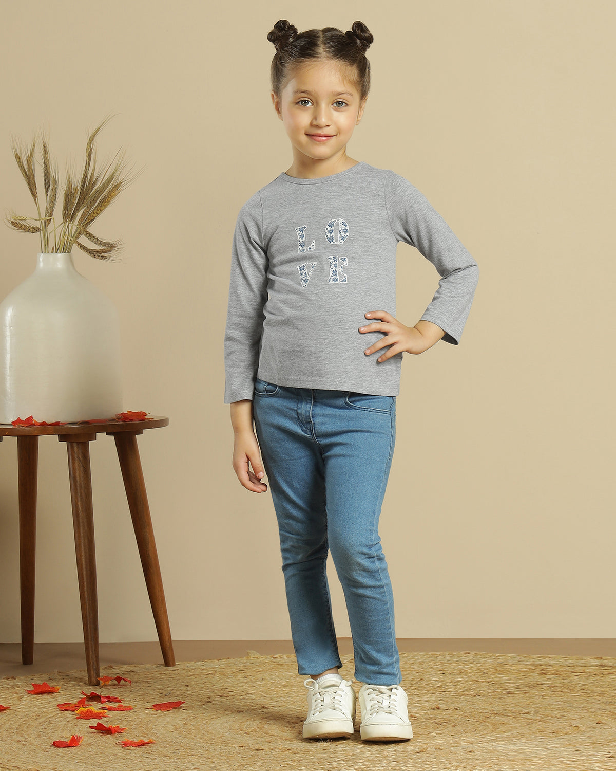 Brown girls wide-leg pants with elasticated waist and relaxed fit