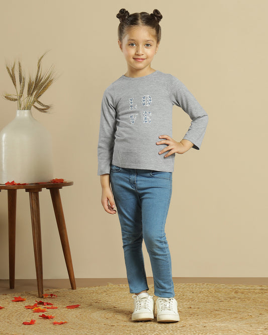 Brown girls wide-leg pants with elasticated waist and relaxed fit