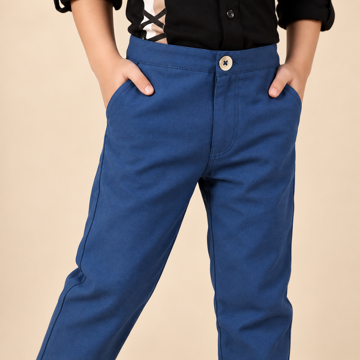 Blue boys casual trousers with straight-leg fit and clean finish
