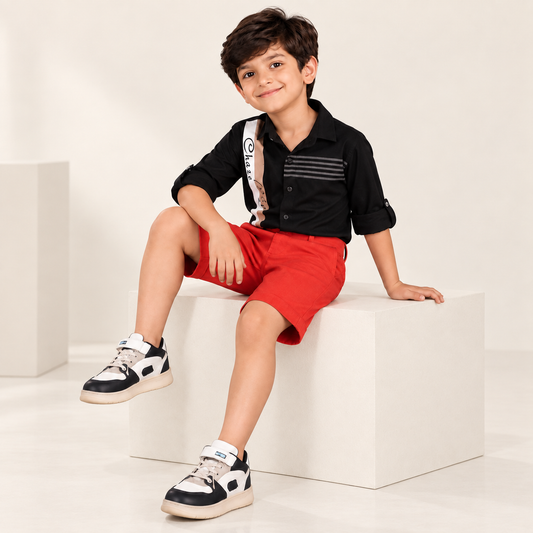 Red boys casual shorts with elasticated waist and knee-length fit
